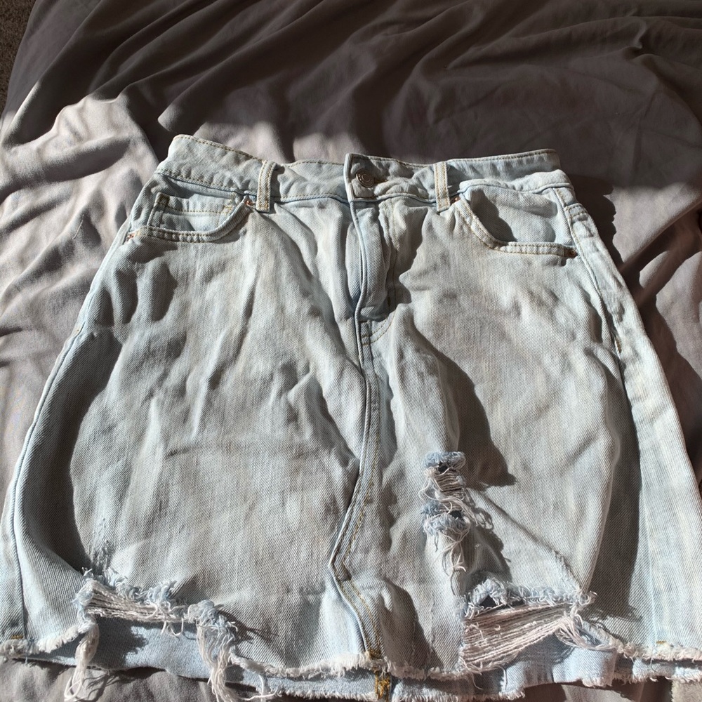 Distressed jean skirt